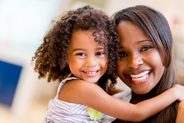 Mother and child, together, happy and smiling